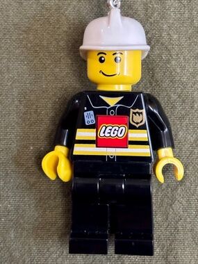 LEGO "LED Torch Fireman"UC21176-1 Like NEW. Batteries recently replaced.